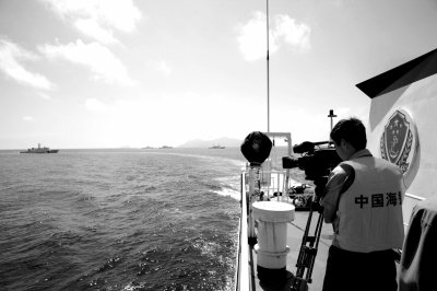登錄手機應用平臺,免費下載并使用“云拍”,拍攝圖片觀看視頻。中國海警船在釣魚島海域維權巡航。國家海洋局供圖